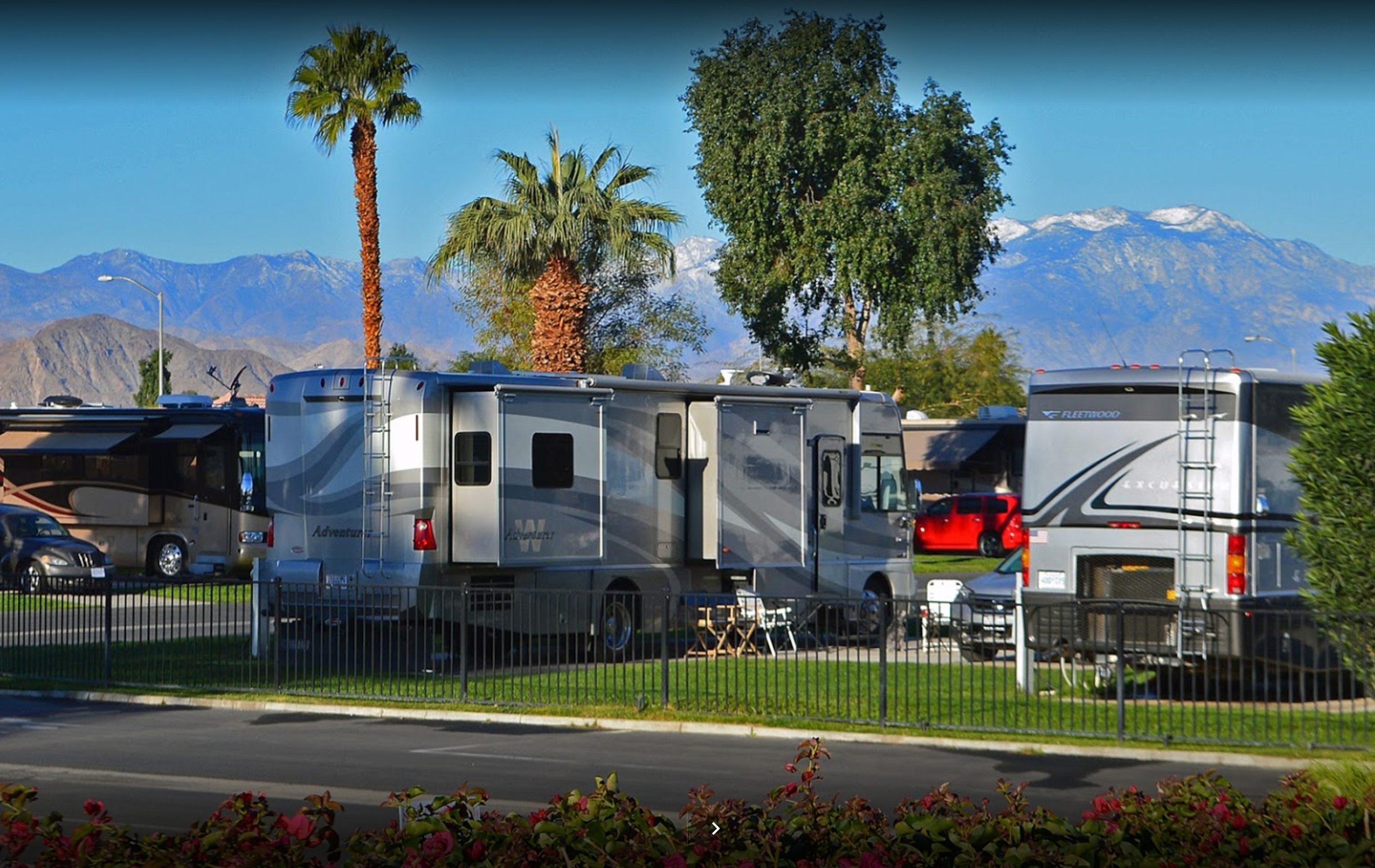 back of two RV in front of mountains at Indian Water RV Resort